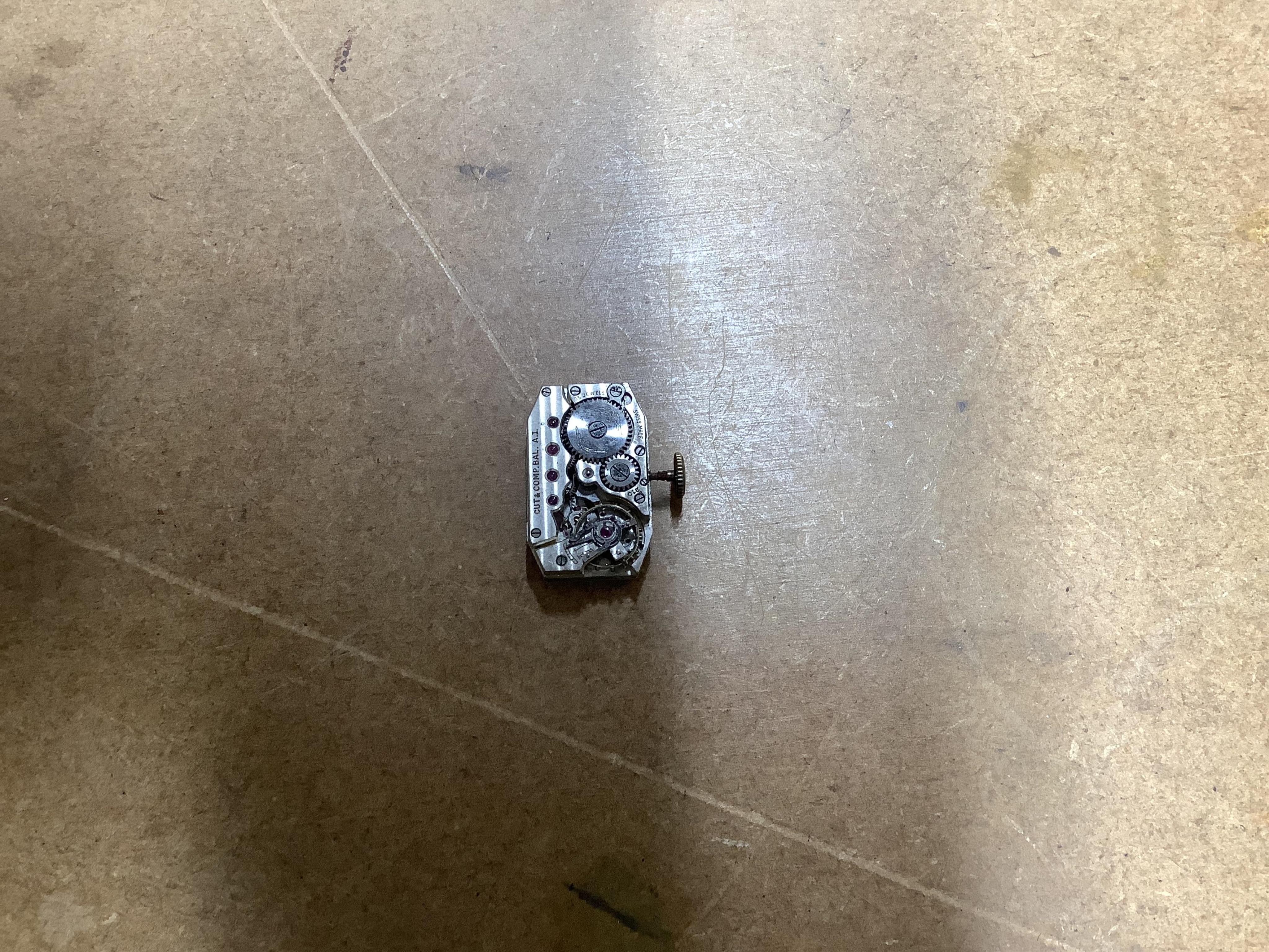 A 1930's Swiss 9ct gold rectangular cased jump hour digital manual wind wrist watch, case diameter 21mm, no strap, together with a continental engraved 14k gold open face keywind fob watch, with Roman dial, case diameter